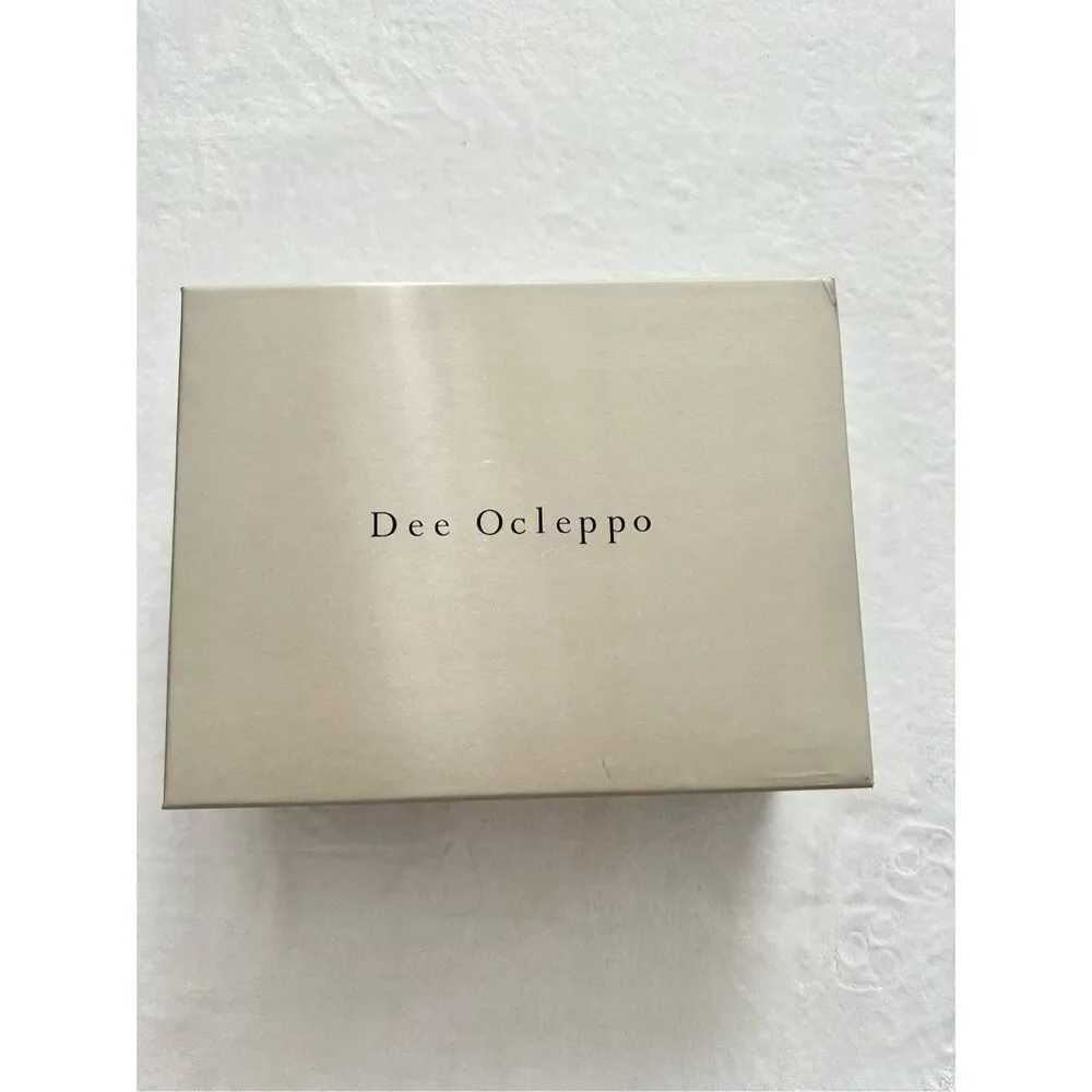 Dee Ocleppo - grey and pink empty shoebox with dust bag